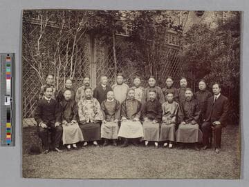 Group portrait of 19 men, Shanghai, China, Chang in business suit (far right)