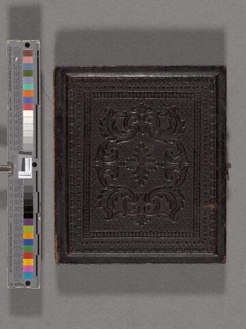 Two unidentified women, one with hand on shoulder of other