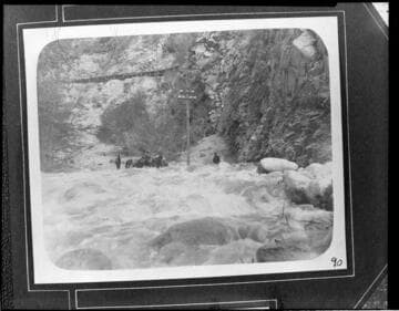 Crews inspecting the transmission lines during a flood in Santa Ana River Canyon