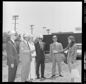 Groundbreaking ceremony with 4 men and a woman