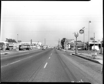 Street lighting in a business district during the day