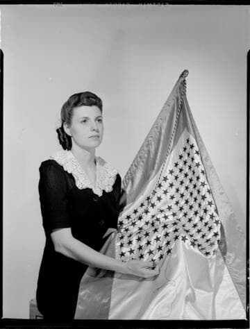 La Nelle Smith with service flag for Electrical Times cover