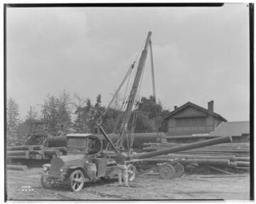 "Take Off" loading poles on "dolly" at the Whittier Railroad Station