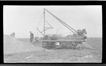 Men with well drilling equipment for tree planting in Tulare County