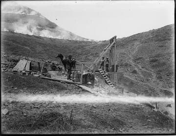 Industrial activity, mining, men with horse