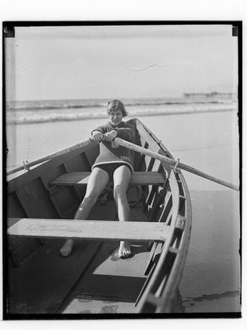 Lily May Bowmer rowing a boat near Santa Monica Pier, California