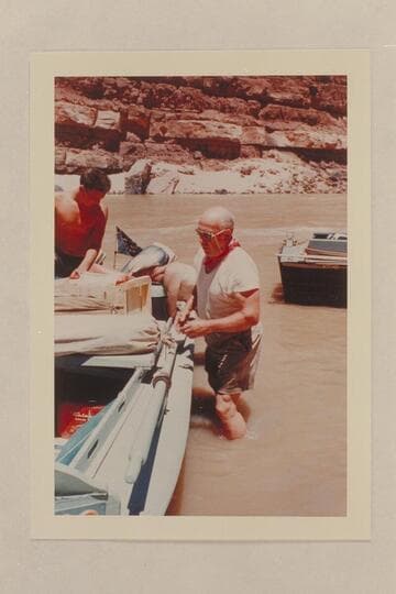 Re-stowing the boats. Above Boulder Narrows. Buzz Belknap and Bill Clawson