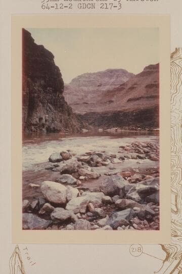 Chopper hovering over Garth in Sportyak; 217 Mile Rapid