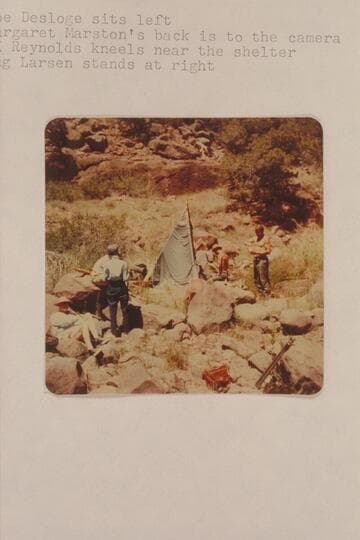 Sunshade for lunch at Hells Half Mile, right bank. Joe Desloge sits left; Margaret Marston's back is to the camera; A. K. Reynolds kneels near the shelter; Lug Larsen stands at right