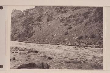 Boat action in Hermit Rapid. Claude appears to be pilot and Belknap passenger. Ed Ralph is on the shore at extreme right