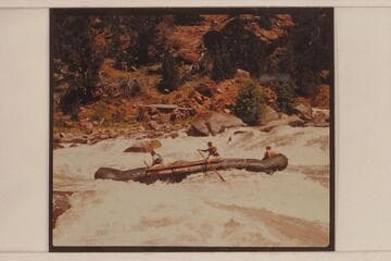 One of the Hatch pontoons in Hells Half Mile; Canyon of Lodore. Bruce Lium handles the oars forward. Pete Farquhar has the other pair. Paul Kaufmann rides as passenger