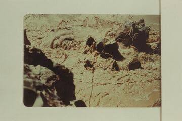 Upset at Mile 232.4: Mrs. Schlosser being hauled across on rop, Frank Wright and John Harper were being pulled on shore and Duane Bishop and Bill Thompson are holding the rope on the rock