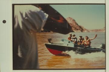 The "Bootoo" on Lake Mead at the foot of Iceberg Canyon. Buzz Belknap at the controls