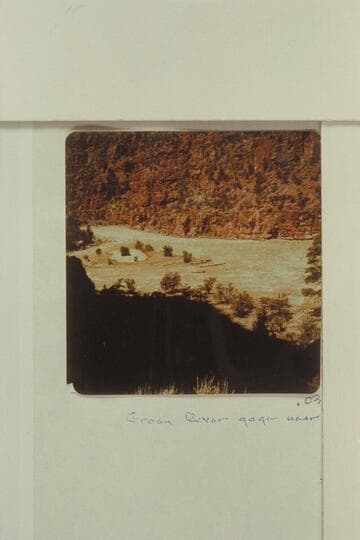 Down river showing the lower end of Disaster Falls and No Name Island where the Powell boat cracked up on June 8, 1869