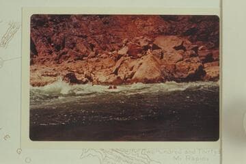 Riding Gneiss Canyon Rapid in life jackets