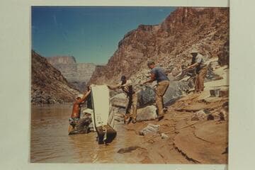 Raising the "Doris" on the right bank.  Willard Wright; Duane Bishop who foundered the sadiron; Frank Wright; John Harper; Bruce Hume trying