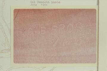 Kolb brothers inscription on the saddle of The Bowknot.  The Kolb brothers climbed the sadle of The Bowknot 1911, Oct. 22, and were in the same area with the Geological Survey 1921, Sep. 11 or 12