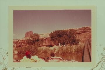Gas station at Townsite or Anderson Bottom. One of the Buttes of the Cross at upper left