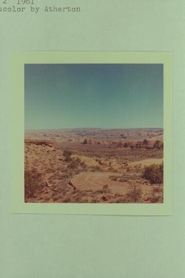 Easterly to the San Juan across Desha and Piute Canyons from look-out on road east of Navajo Begay. The valley was named Dumpling Valley by Berhheimer