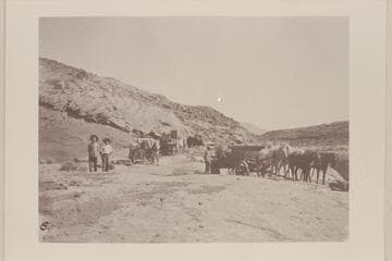 Supplies being hauled in for dredge.  R. B. Stanton, Jr. and A. B. Starr (friend) in foreground