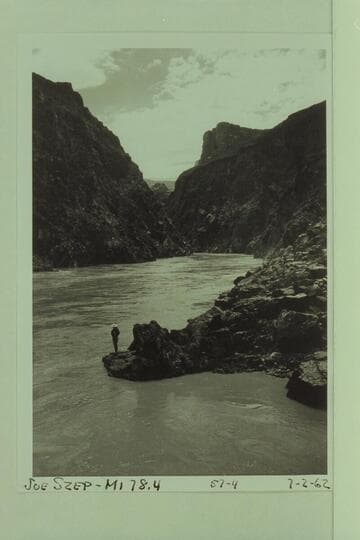 A smoothed Sockdologer Rapid. Joe Szep on the rocky point at Mile 78.4