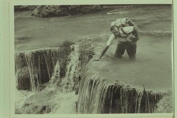 Jorgen Visbak crossing Supai Creek on one of the travertine dams between the village of Supai and Beaver Falls