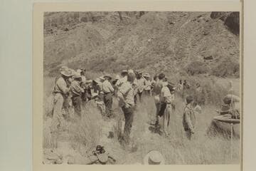 The Bundy family at Whitmore Trail welcoming the "Esmeralda II", the first motorboat to transit Grand Canyon