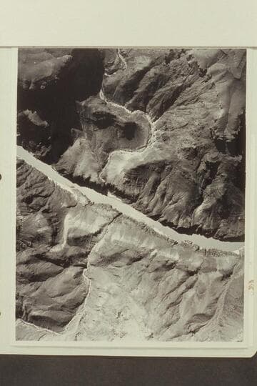 Bass Canyon upper center; Hotauta Canyon enters lower left; Bass Rapid at center. The river enters from left at Mile 107. Stanton's Switching Yard is right bank center