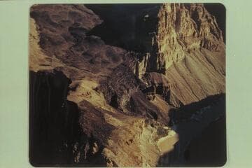 Lava flow to the river from Queantoweap or Hurrican Ledge Valley. The road and the trail can be seen on the lava