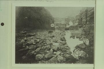194. Down from Camp 40 in Marble Canon. Brown-Stanton Survey. The view is from right bank near Paradise Canyon. Stanton cached his supplies and equipment and left the river here. Vaseys Paradise is just around the bend of river