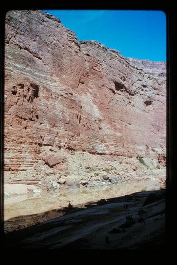 Chopper on dock from tunnel; M.C. dam site