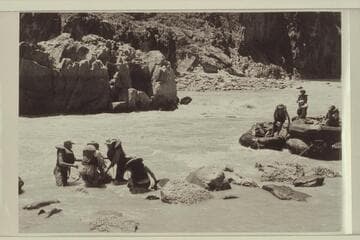 The "Queen Mary" of the Georgie White fleet in trouble at Bedrock Rapid