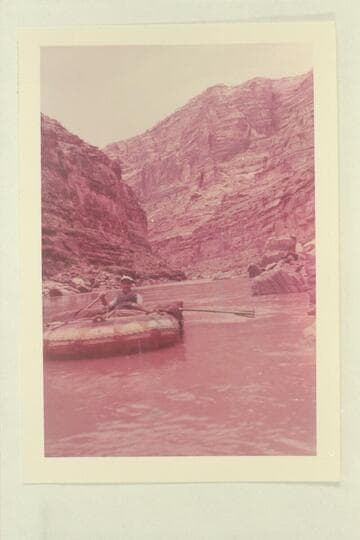 Bill Davis and his 7-man rubber boat. Mile 180 1/2 end of rapids of any size