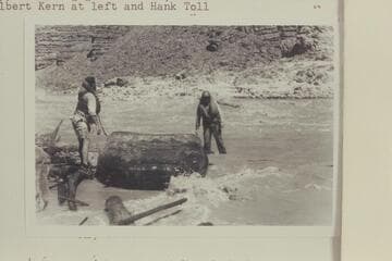Albert Kern and Hank Toll salvage the "Dark Angel" in eddy at right bank; at 24.5 Mile Rapid after capsizing