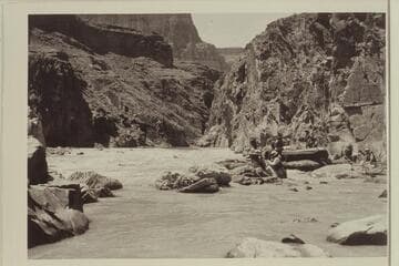 Georgie White's pontoon craft "Queen Mary" in trouble in Bedrock Rapid