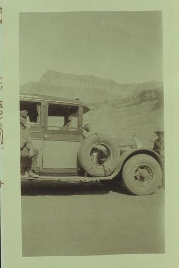 Bus at the dedication of the Marble Canyon Bridge. Print from the Freeman collection