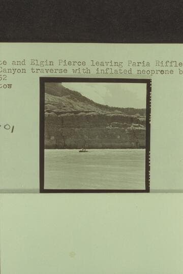 Georgie White and Elgin Pierce leaving Paria Riffle for the Grand Canyon traverse with inflated neoprene boat