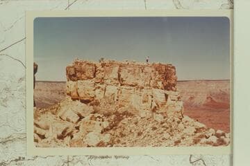 Bruce atop Enfilade Point walled ruin. North with Fossil at left and Stanton Point at right