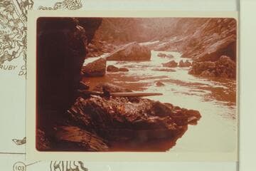 Upriver to camp at Mile 99.6.  Captioned:  Sapphire Camp #9