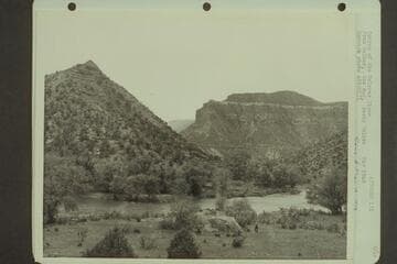 Canyon of the Dolores River.  Pres Walker, the dog, Becky Walker.  Camp below Bedrock