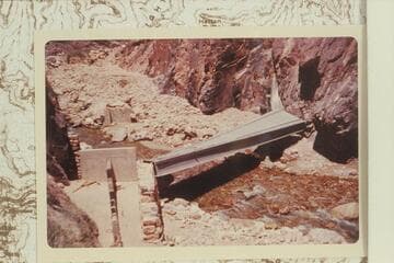 Aluminum bridge after 1966 flood in Bright Angel Creek had wrecked it. Located in The Box