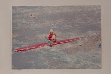 Third day of the cruise from Potash to the Dirty Devil River. The caption on the back of the print reads: Day 3 Big Drop Mile 202-203. Ty Dines, foreground. Kenny Moore, left background