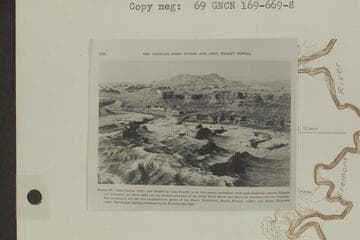 The Dirty Devil at the right and its confluence with the Colorado River at the head of Glen Canyon