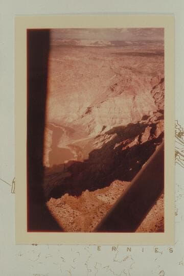 Up to the side canyon at Mile 206.85. An intrusion of the Paradox Formation is cut by the stream