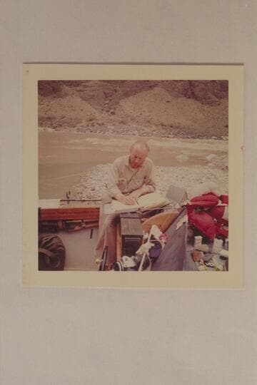 Jim Algar studies the script for the making of Disney's "Ten Who Dared." Grand Canyon