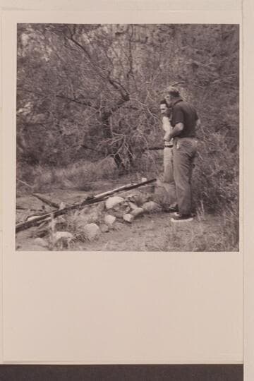 Don Harris and Rod Sanderson at grave of David Quigley. Marble Canyon. President Harding Rapid. Mile 43.5. David Edward Quigley. Drowned 1951, June