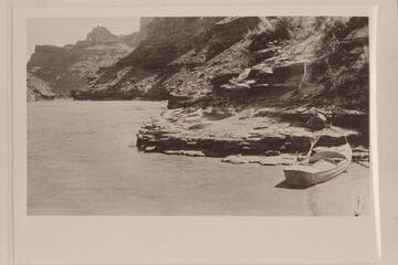 Looking down Green River to its junction with the Colorado.  Camp at the right, one mile above the mouth of Green River