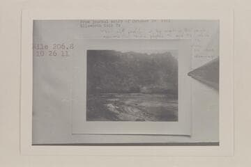 The skiff of Charles Smith at lower right. The two Kolb boats lower center in Cataract Canyon at Mile 206.8 left bank