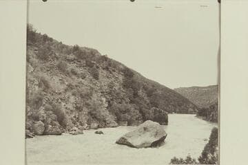 Lining boat down right bank at Ashley Falls. Nevills party