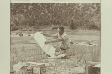 Willie Taylor studies the charts.  Red Canyon